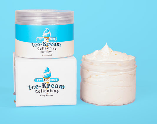 The Ice-Kream Collective Unscented body butter in a clear jar with blue and cream packaging, displayed next to its branded box on a pastel blue background.