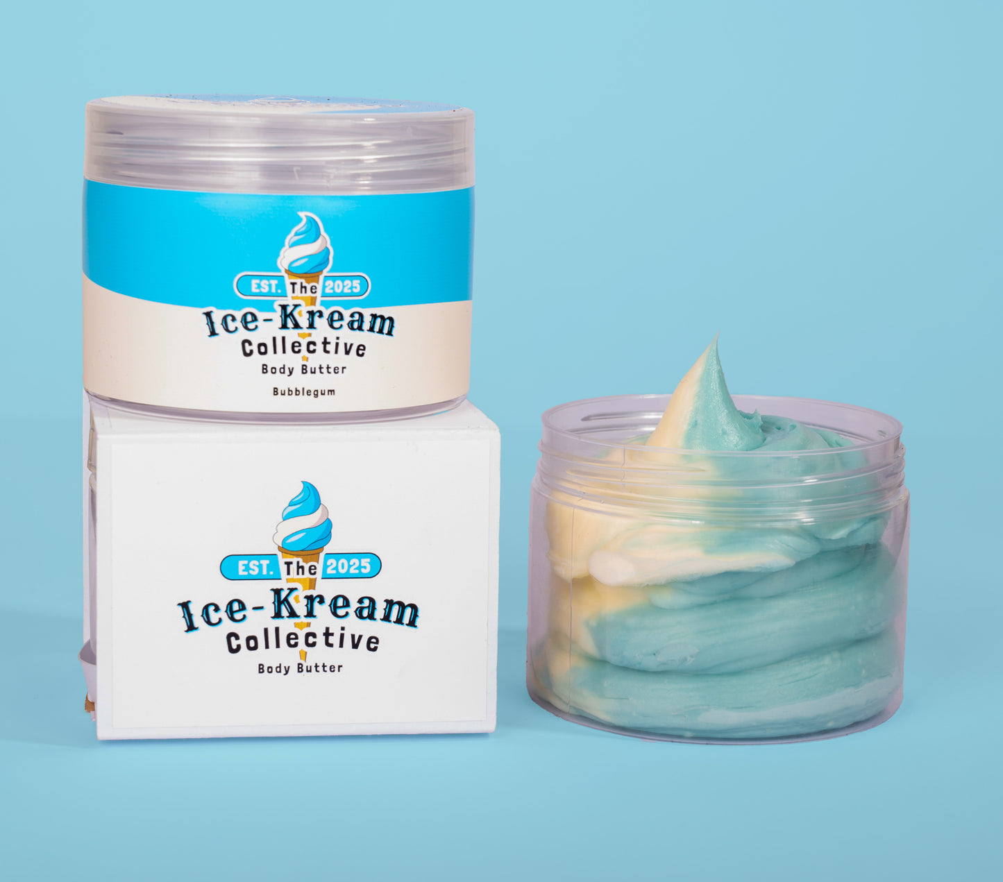 The Ice-Kream Collective Bubblegum body butter in a clear jar with blue and cream packaging, displayed next to its branded box on a pastel blue background.