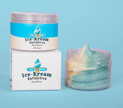 The Ice-Kream Collective Bubblegum body butter in a clear jar with blue and cream packaging, displayed next to its branded box on a pastel blue background.