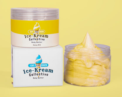 The Ice-Kream Collective Honey Milk body butter in a clear jar with yellow and cream packaging, displayed next to its branded box on a pastel yellow background.