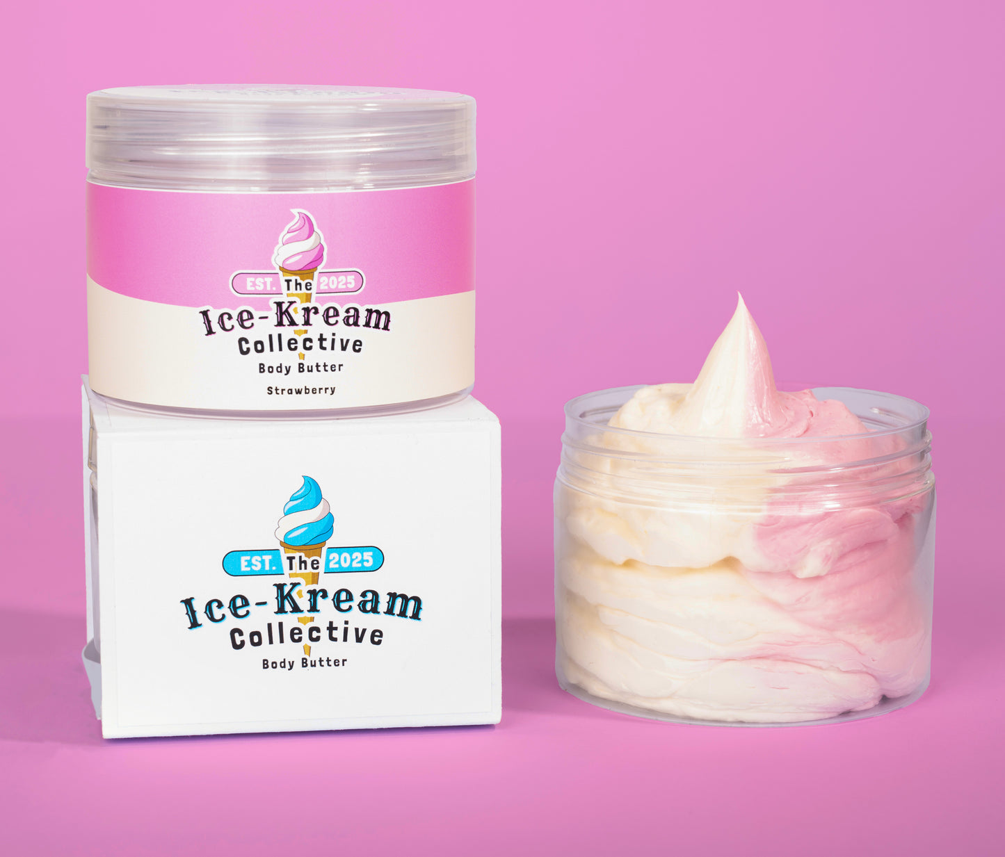 The Ice-Kream Collective Strawberry body butter in a clear jar with pink and cream packaging, displayed next to its branded box on a pastel pink background.